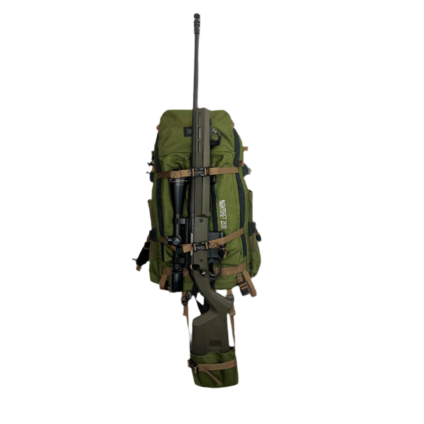 A 6.5 Creedmor rifle attached to the back of a green and coyote tan Nightshift Pack using the weapon cradle system