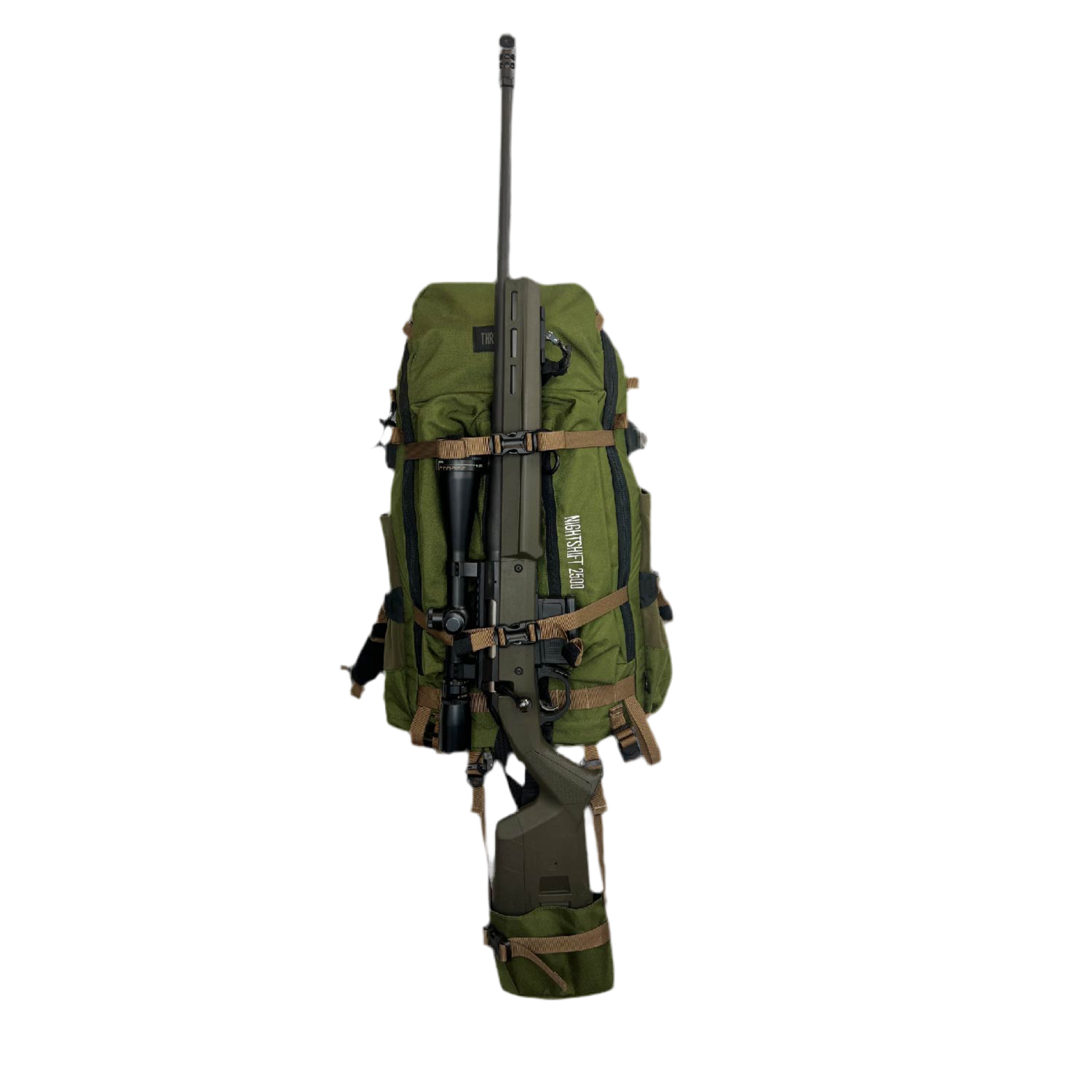 A 6.5 Creedmor rifle attached to the back of a green and coyote tan Nightshift Pack using the weapon cradle system